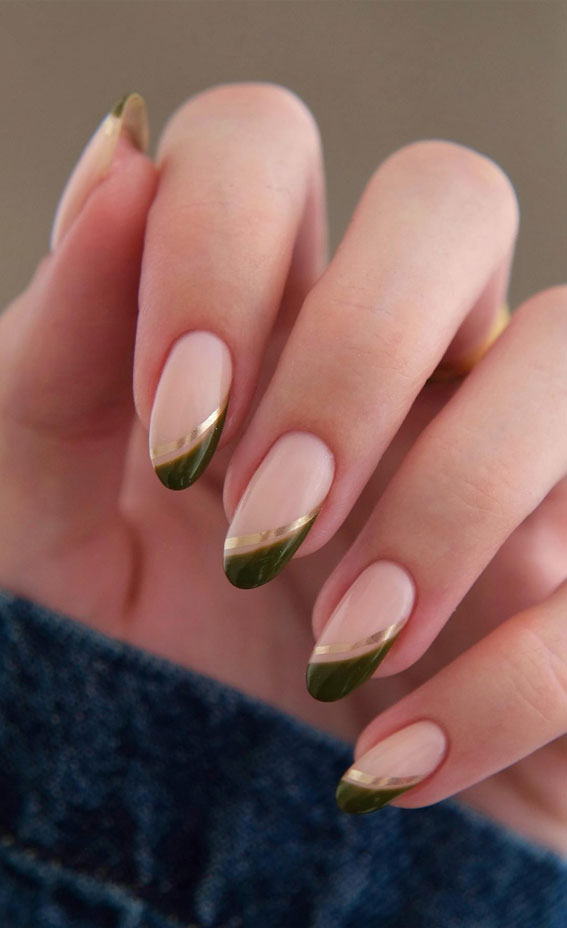Deep forest-green French tips with a thin gold line on nude nails