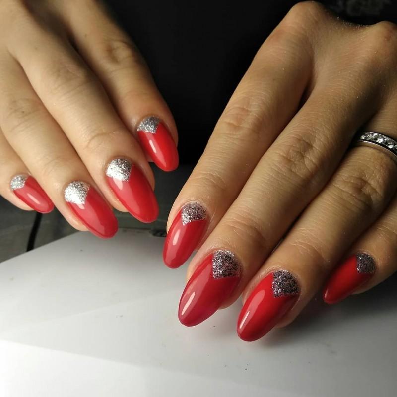 Red nails with silver glitter cuticle accent