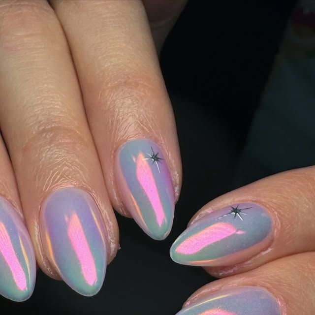 Aurora unicorn chrome nails shifting between iridescent pastel tones