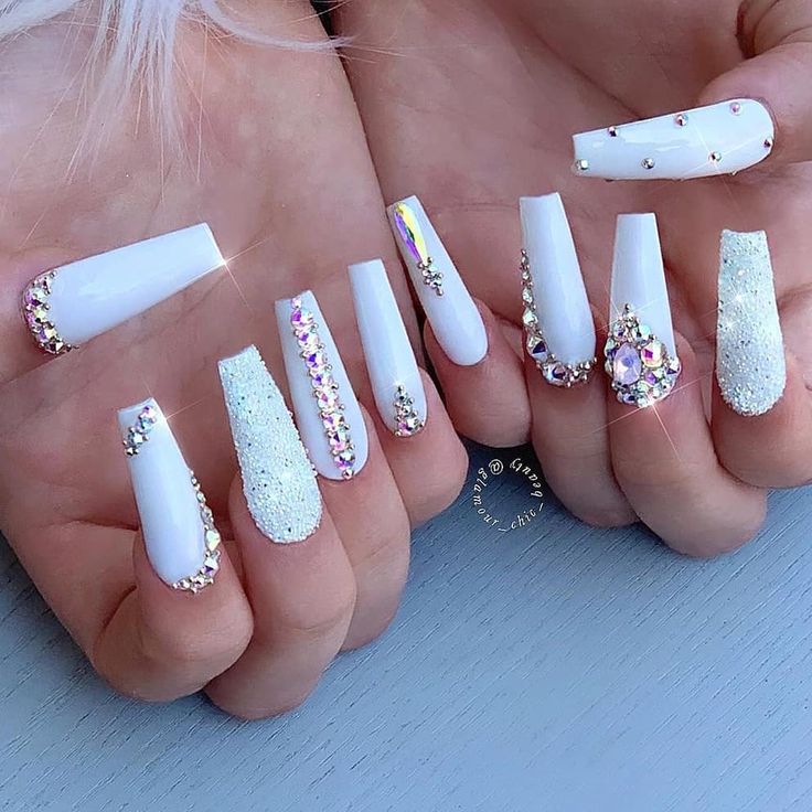 White coffin nails decorated with crystals