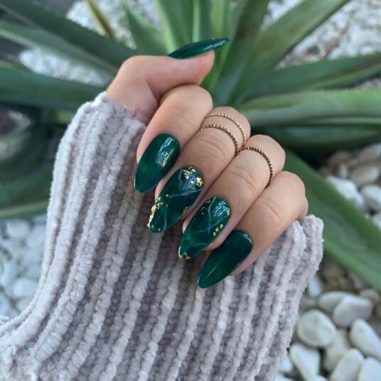 Long almond winter nails with emerald green marble swirls