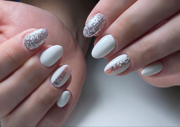 Matte white nails with silver glitter accent