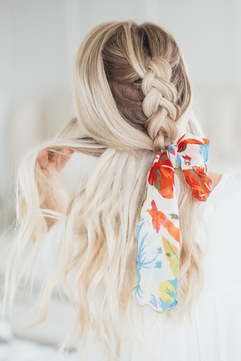 Half-up braid tied with a printed scarf