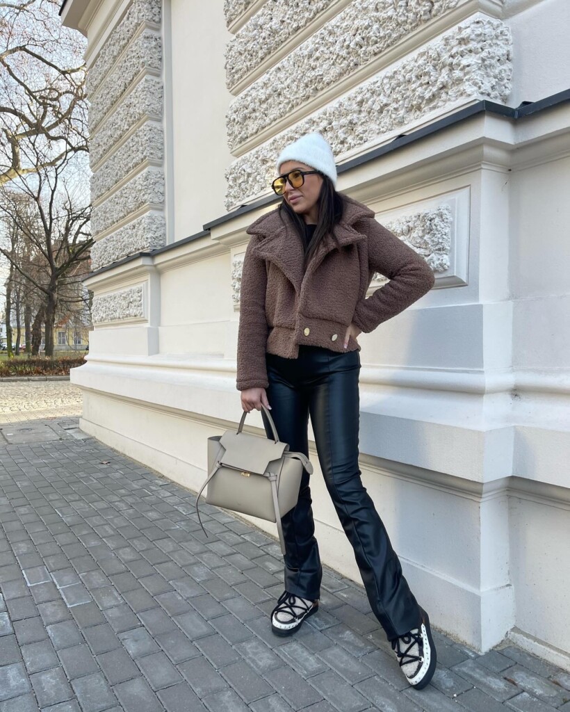 Woman in a cozy teddy fleece jacket, casual winter outfit