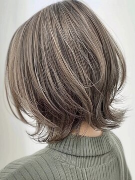 Feathered ash brown bob haircut