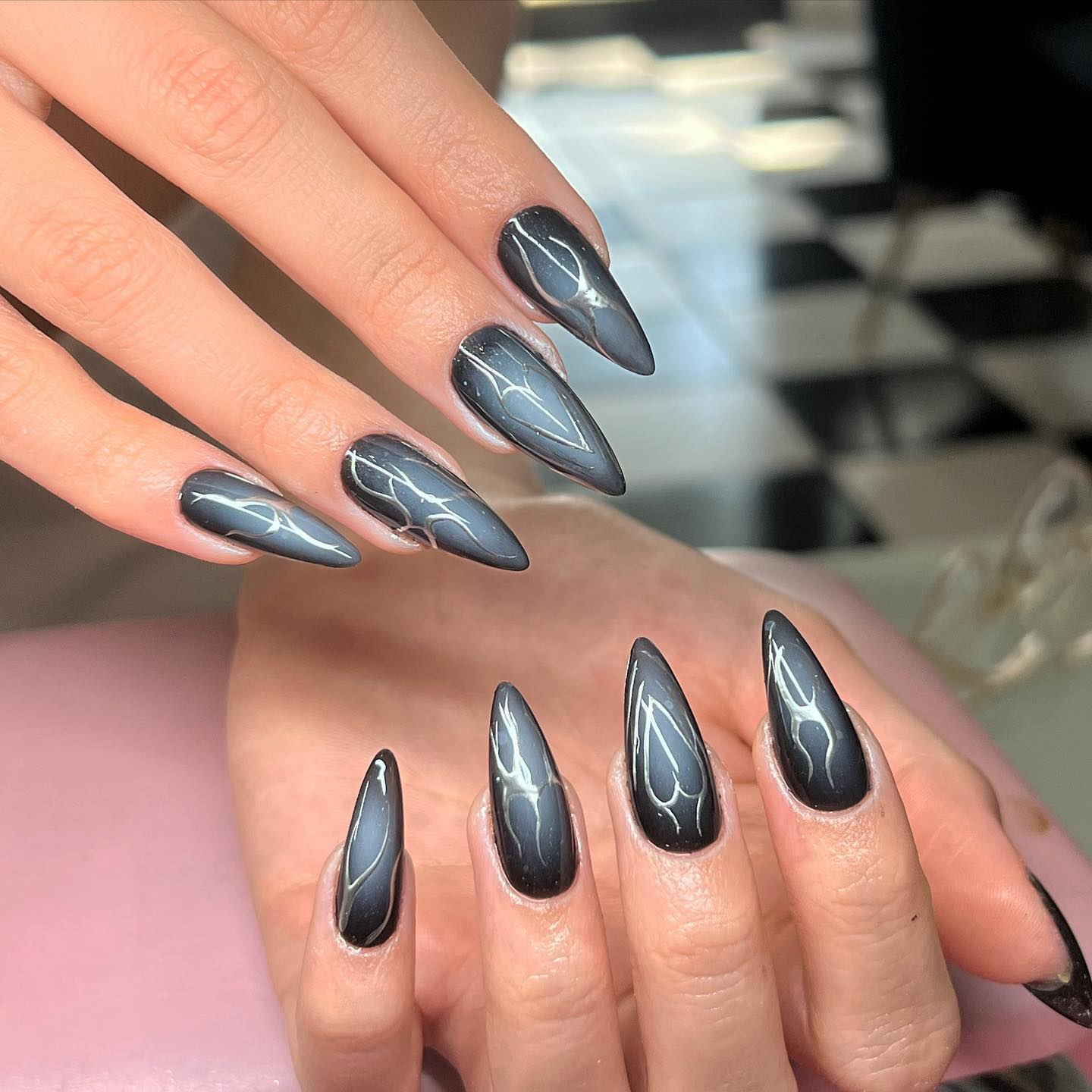 Nails with black and silver marble art
