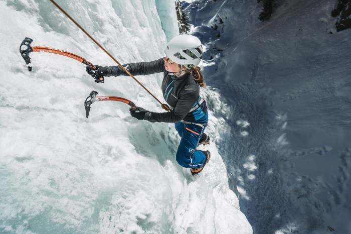 Woman wearing a technical fleece on a glacier hike
