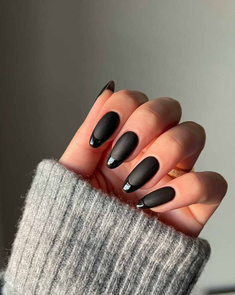 Matte black nails with glossy French tips