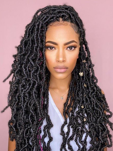 Butterfly locs with distressed texture and gold cuffs