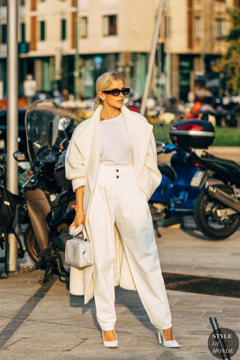 Woman in an all-white winter outfit, street style