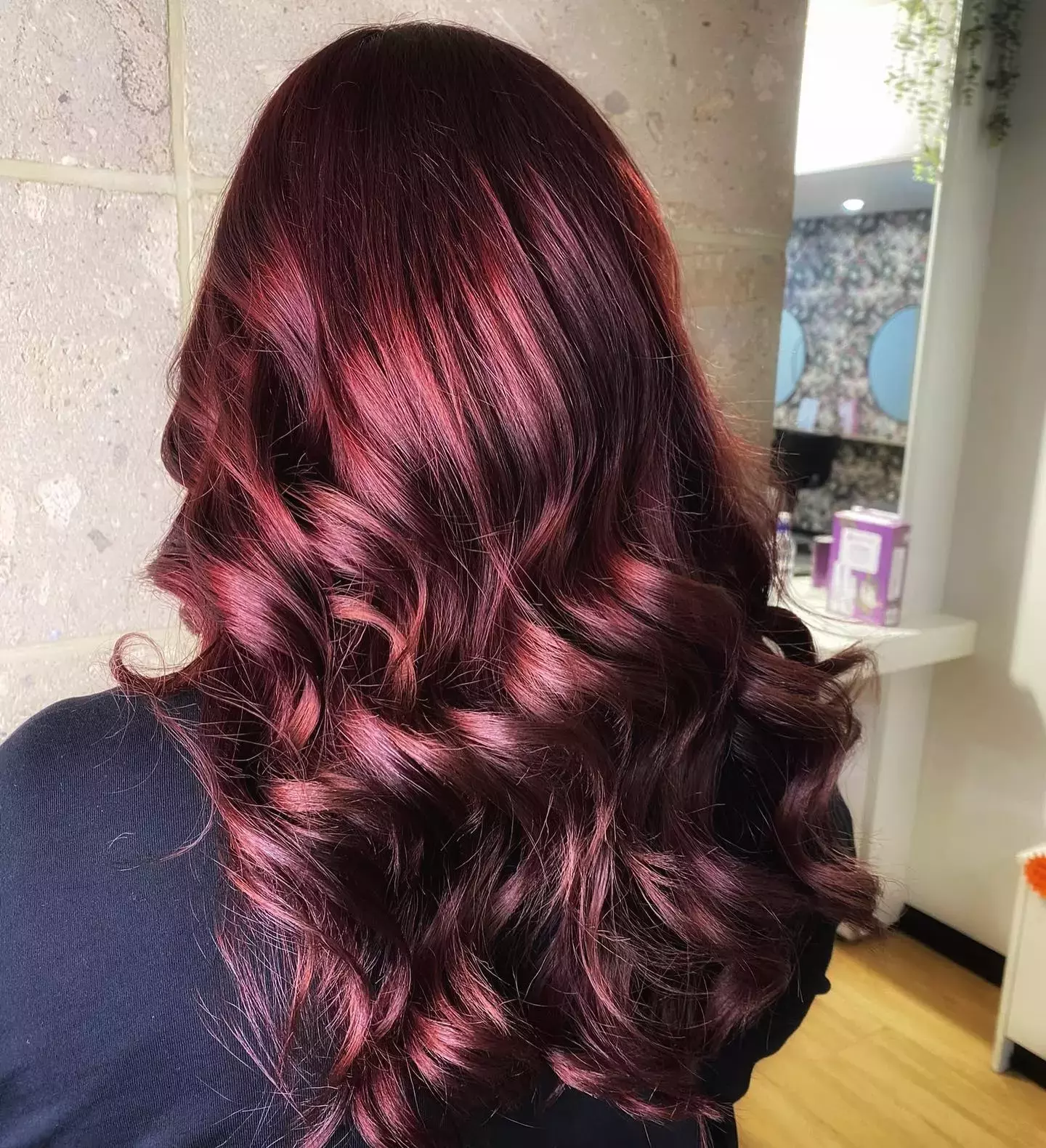 Rich mahogany color on full cascading curls