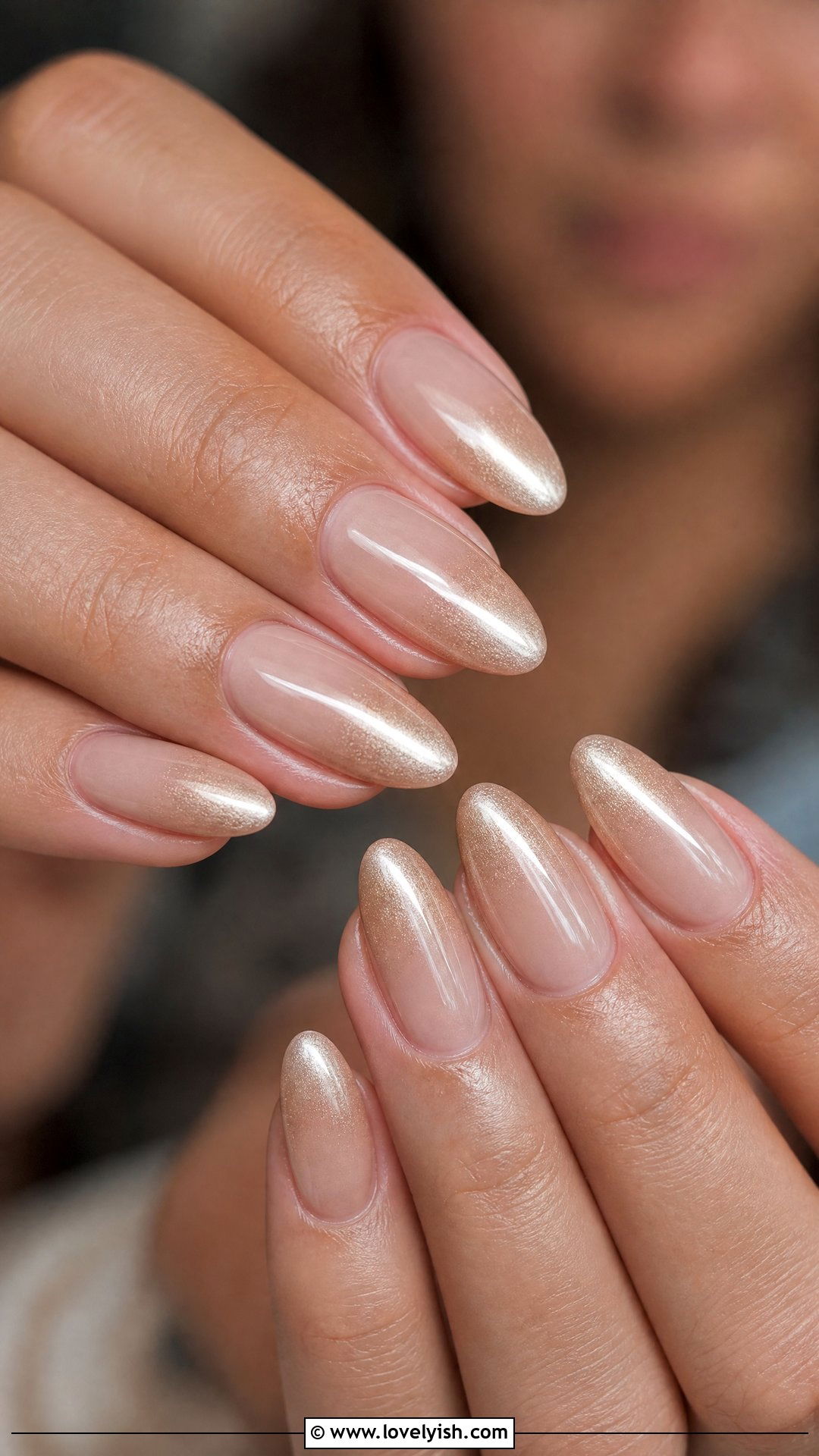 Champagne Ombré: a nude base fading into champagne shimmer on almond nails