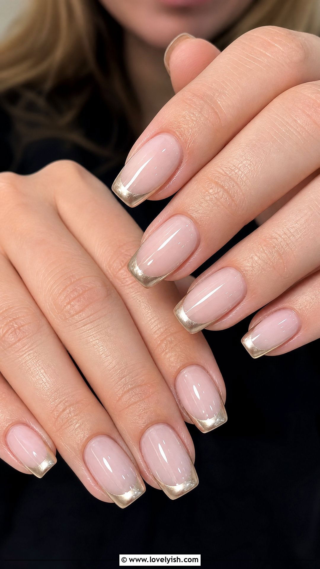Champagne French Tips: metallic gold-chrome French tips over a sheer nude base on squoval nails