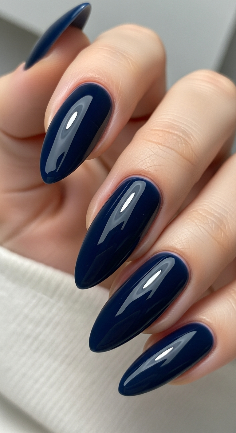 Matte charcoal grey nails in a close-up manicure photo