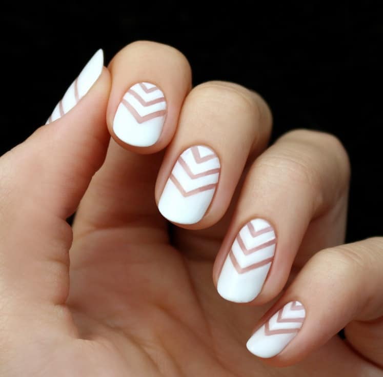 Milky nails with white chevron negative-space line art