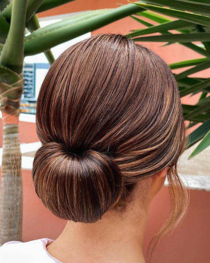 Low chignon updo with textured finish