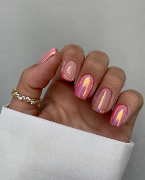 Short nails in pink chrome shimmer polish