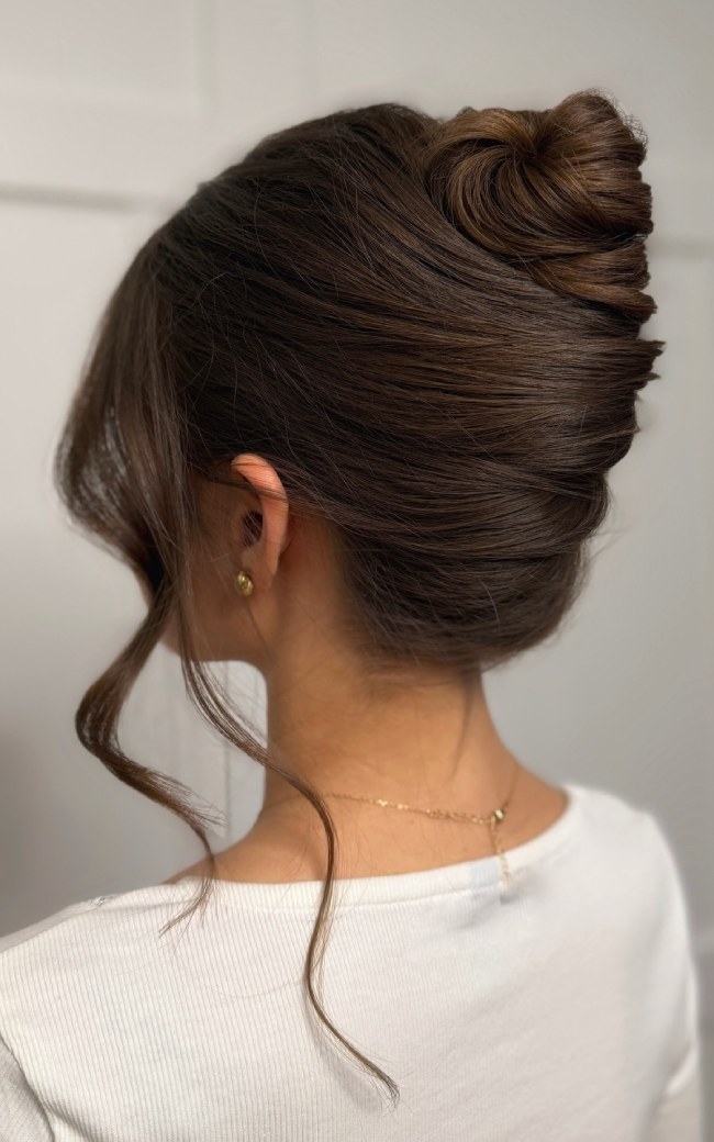 Brunette classic French twist bridal updo