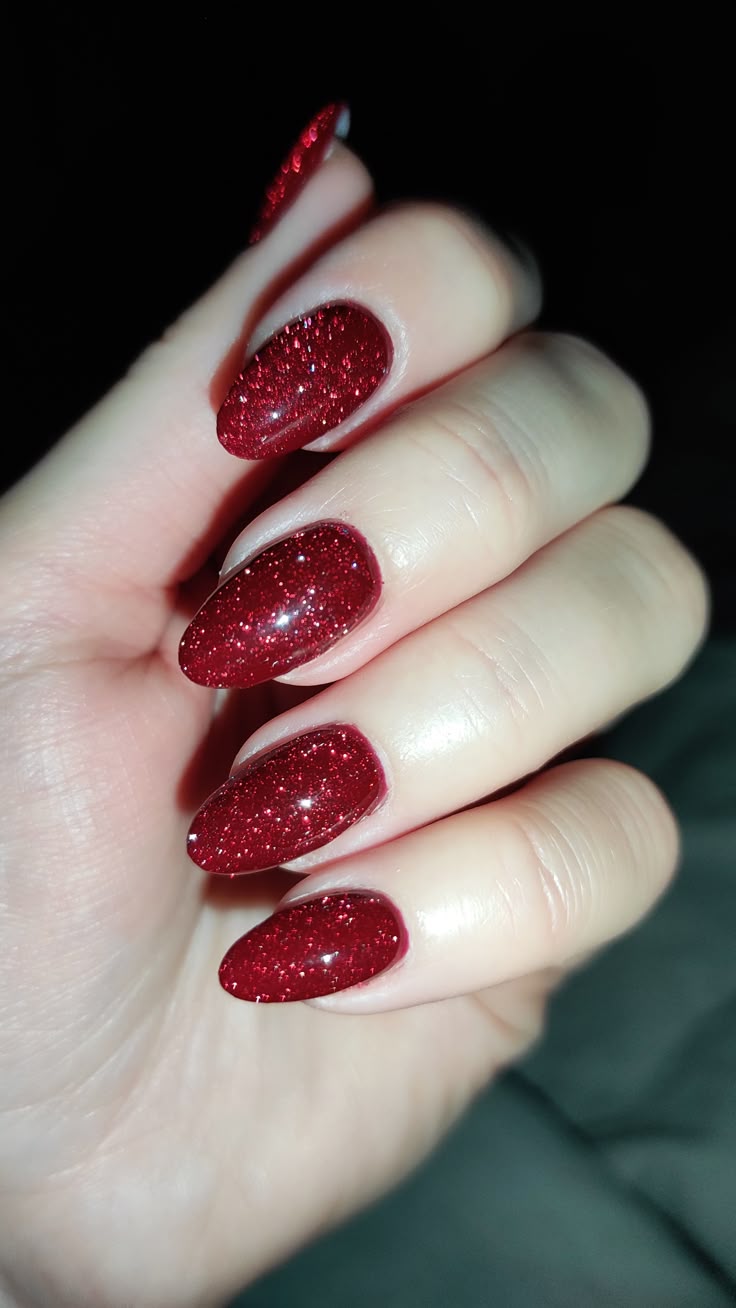 Classic red shimmer nail polish manicure