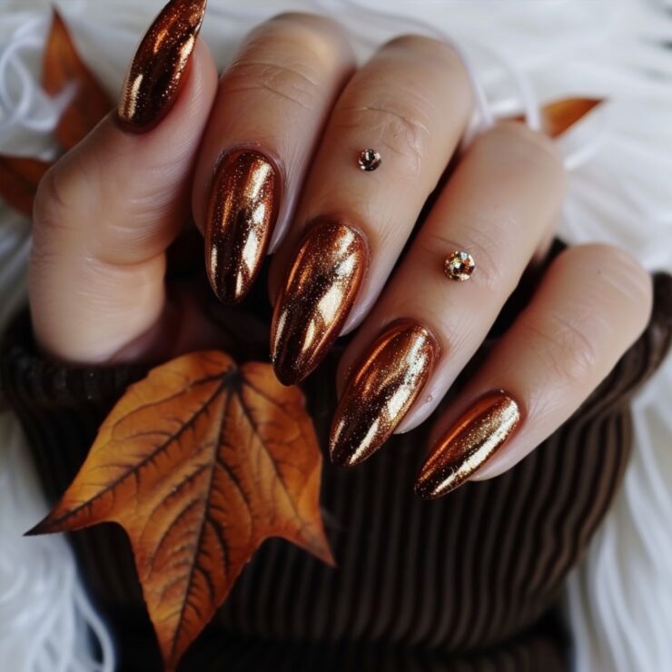 Almond nails in copper shimmer metallic polish