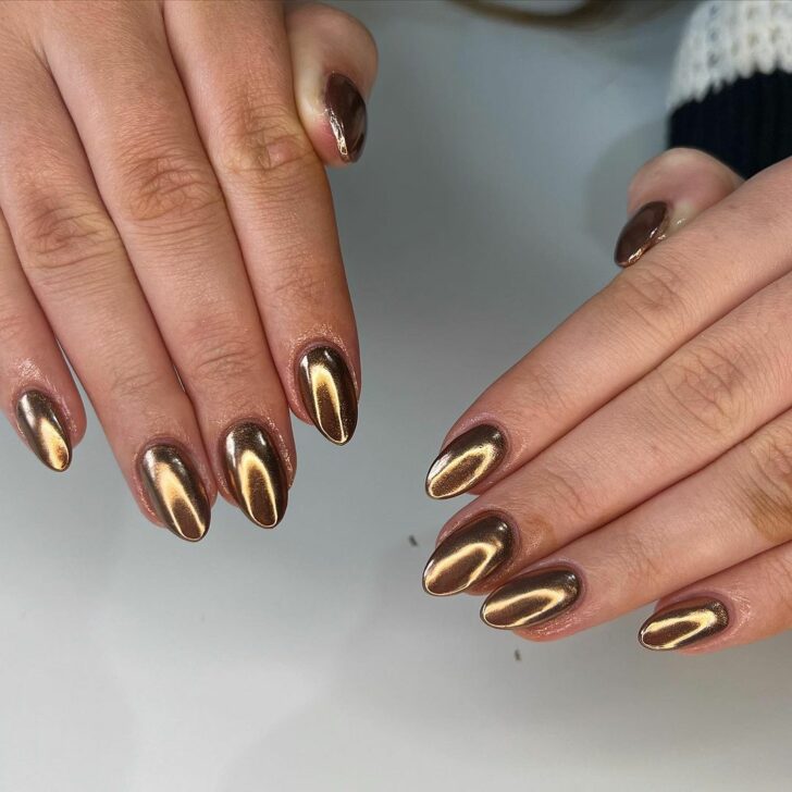 Short oval nails with molten copper chrome finish