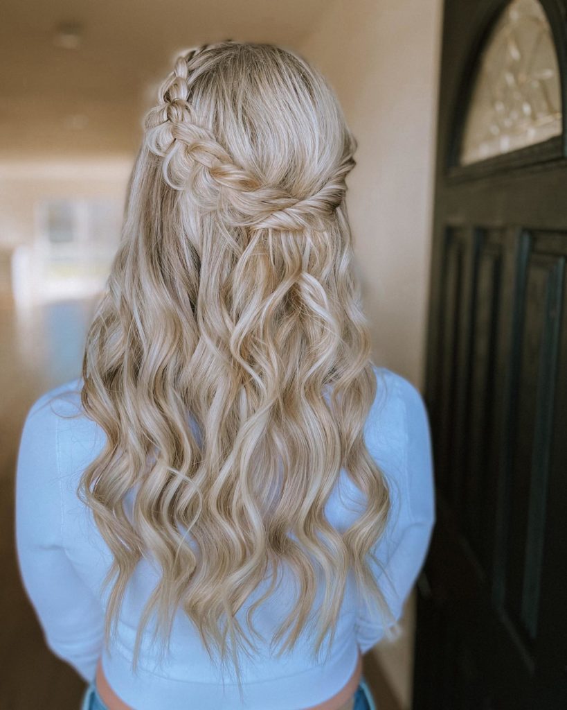 Waterfall braid circling the crown with hair cascading through it