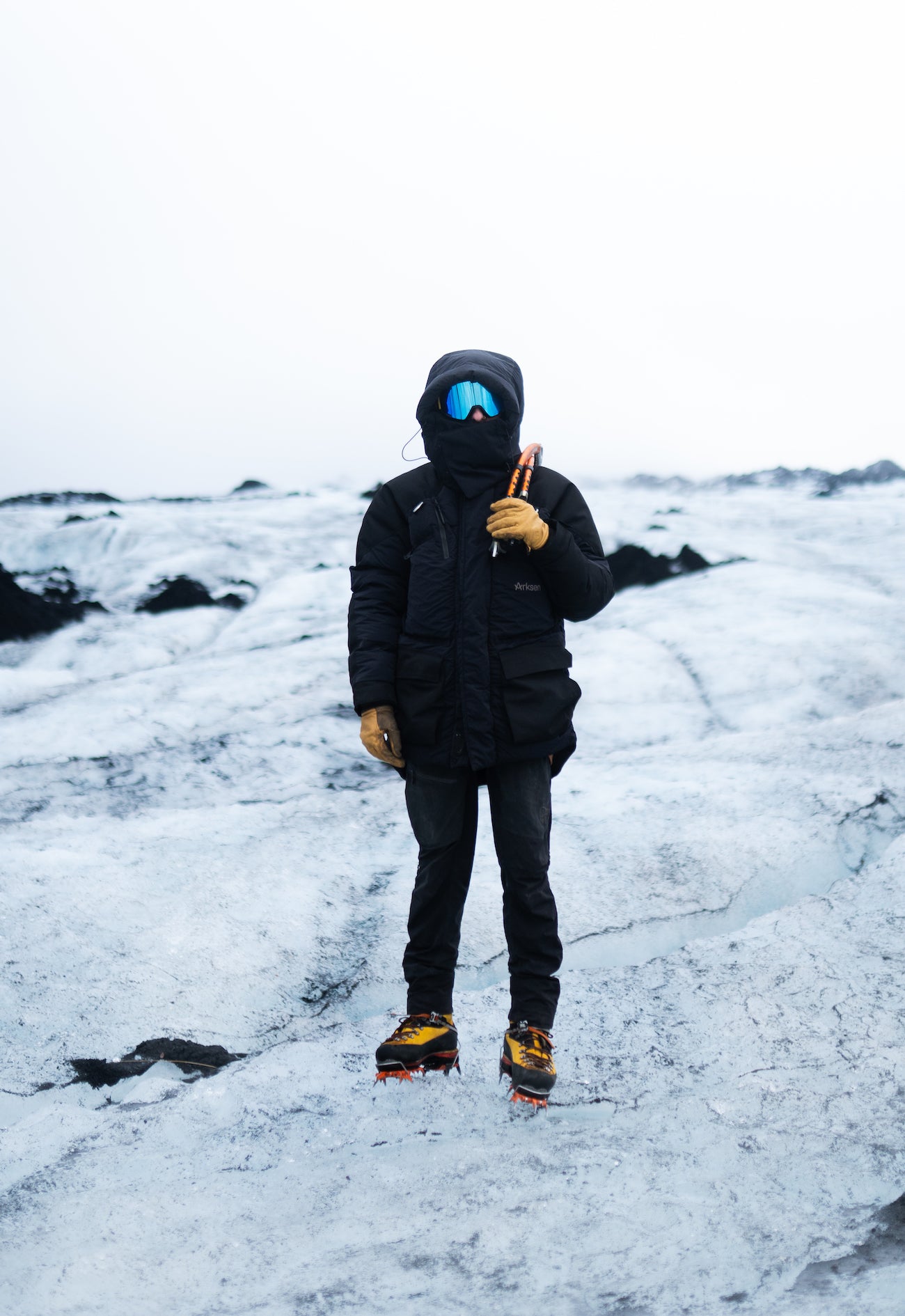 Woman wearing an arctic expedition parka with technical winter layers