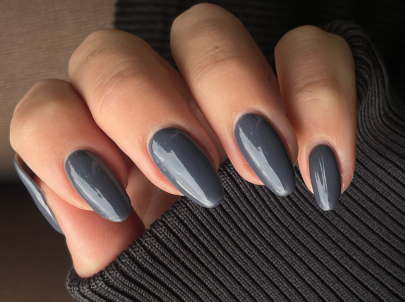 Medium almond nails in cool glossy dove grey