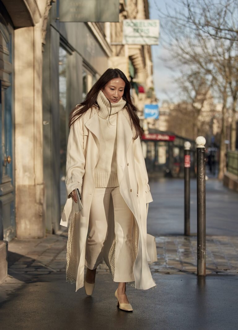 Monochrome Ease: A Cream Trench Coat with Tonal Layers