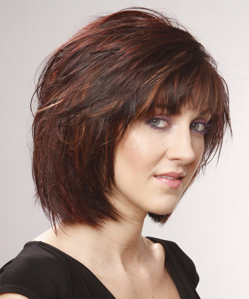 Mahogany red layered bob with side-swept bangs