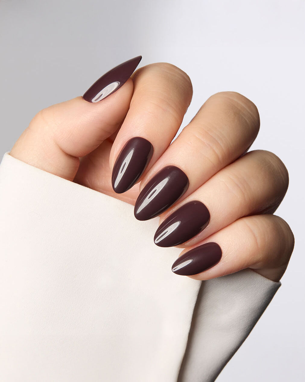Glossy espresso brown almond nails