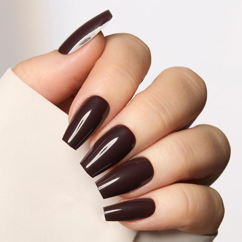 Glossy espresso brown polish on coffin-shaped nails
