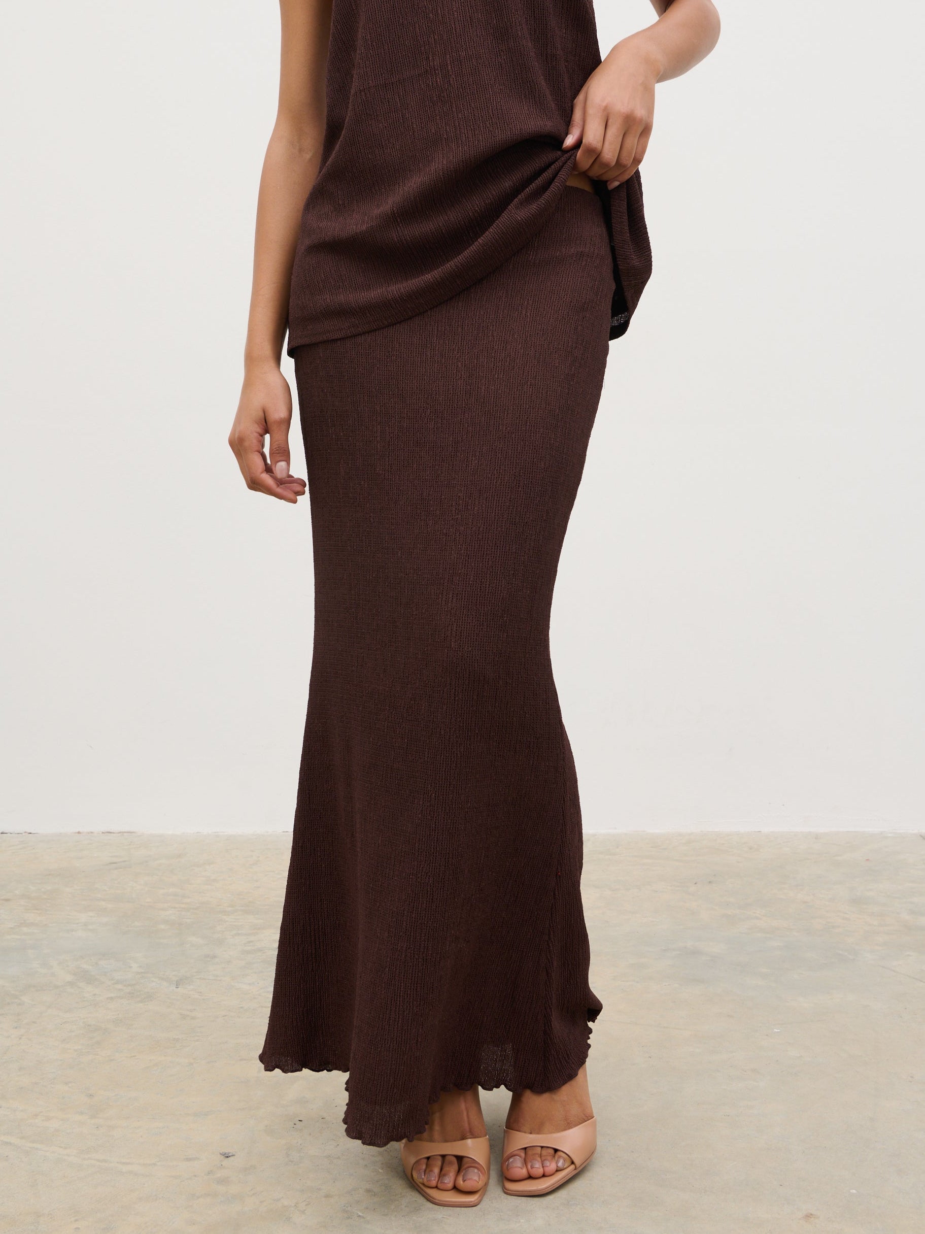 Chocolate brown maxi skirt styled with a fitted knit top