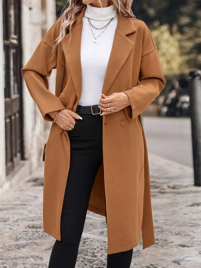 Polished Neutrals: A Camel Wrap Coat with a White Turtleneck and Black Trousers