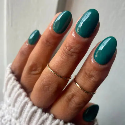 Peacock Teal: a jewel-toned teal cream on medium almond nails