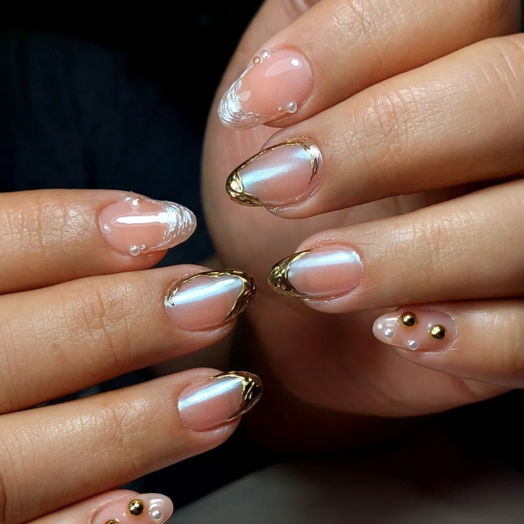 Golden Honey Glaze: warm gold pearl finish on almond nails