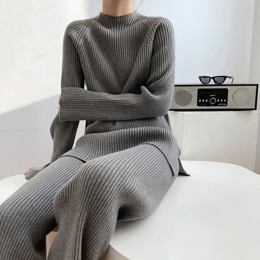 Model in a grey ribbed knit co-ord set with wide-leg trousers