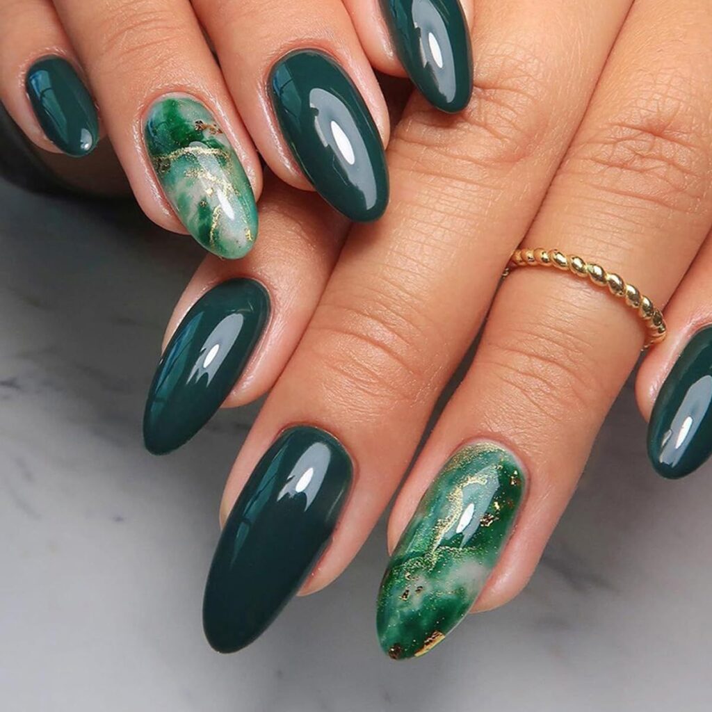 Deep emerald nails with green and gold marble accent nails