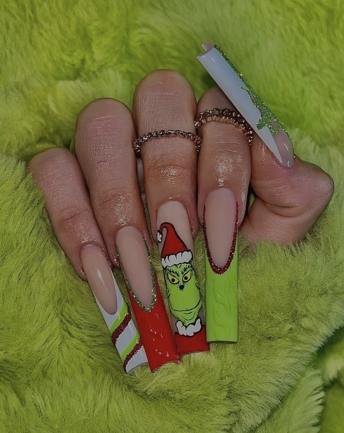 Coffin nails with Grinch art and gold foil metallic accents