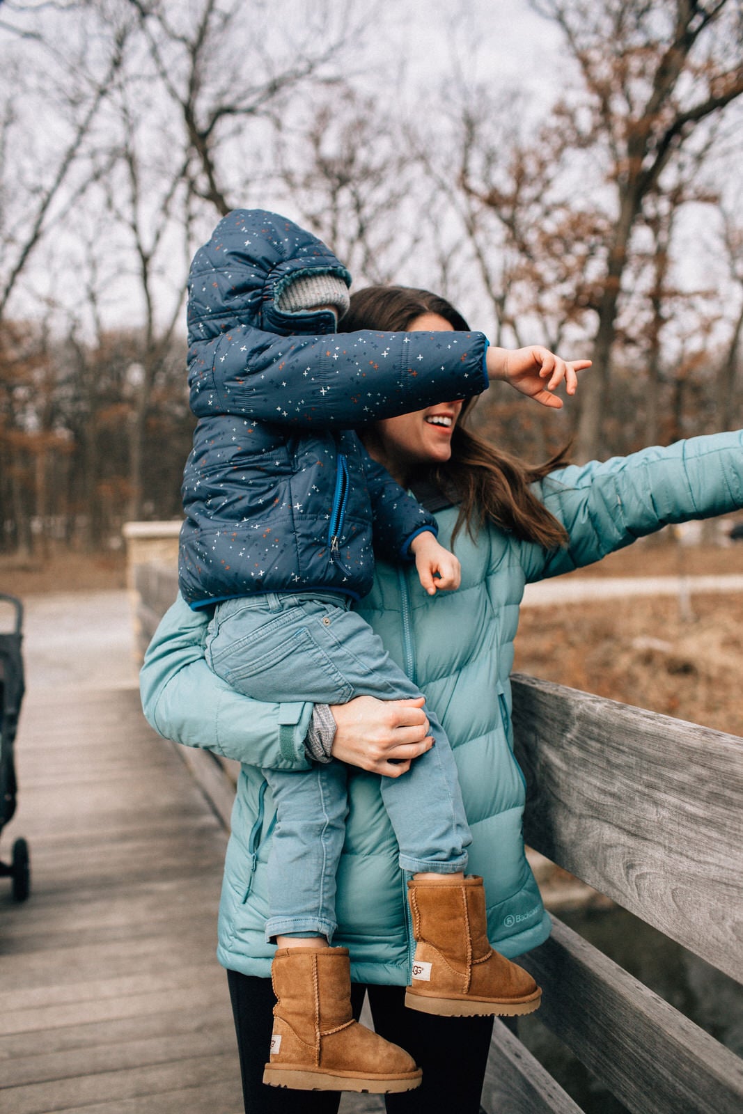Family in winter outerwear outdoors on a winter hike