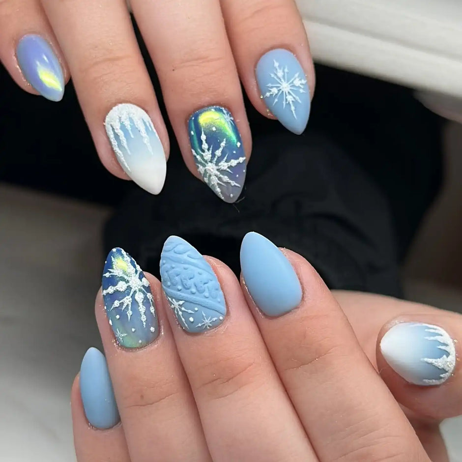 Pastel blue nails with a frosty holographic winter finish