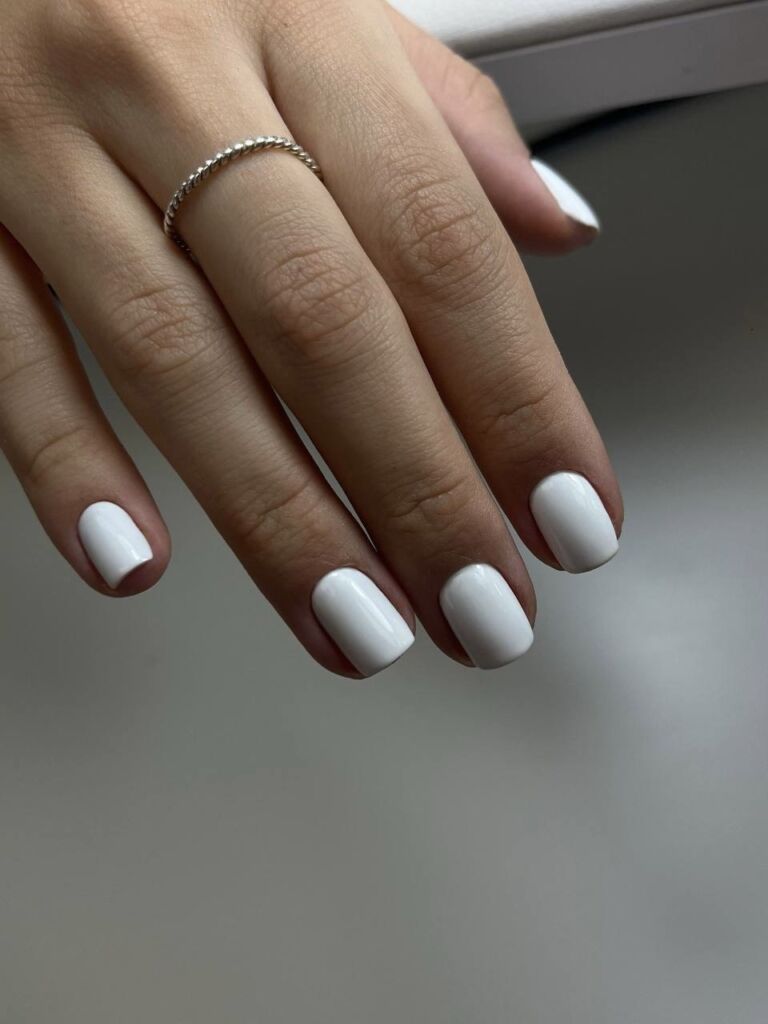 Short square nails in glossy clean white