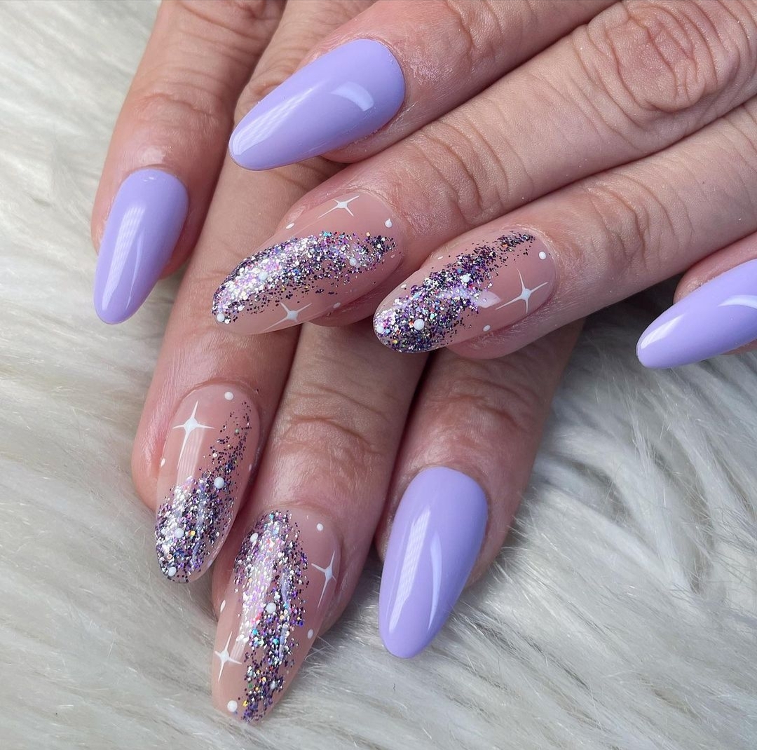 Lavender nails with purple glitter ombre and white star nail art
