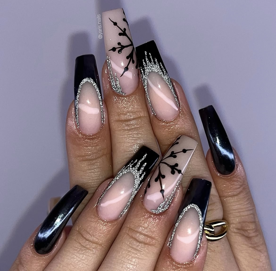 Long black square nails with silver glitter French arcs and botanical art