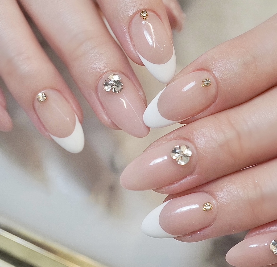 Nude nails with rhinestone crystal accents