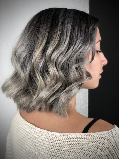 Dark-root silver ombre hair color