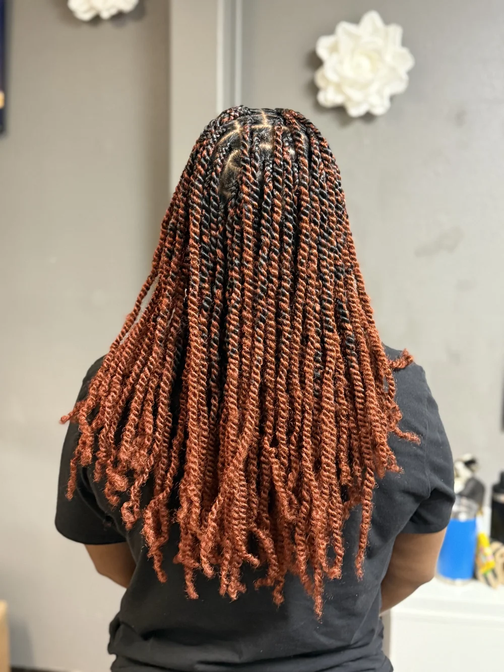 Back view of copper auburn rope twists