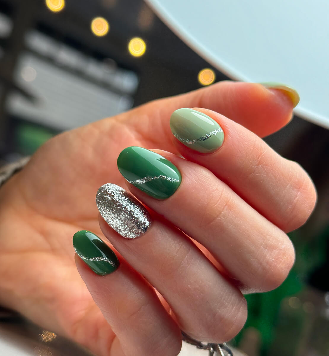 Forest green nails with silver glitter accent nail