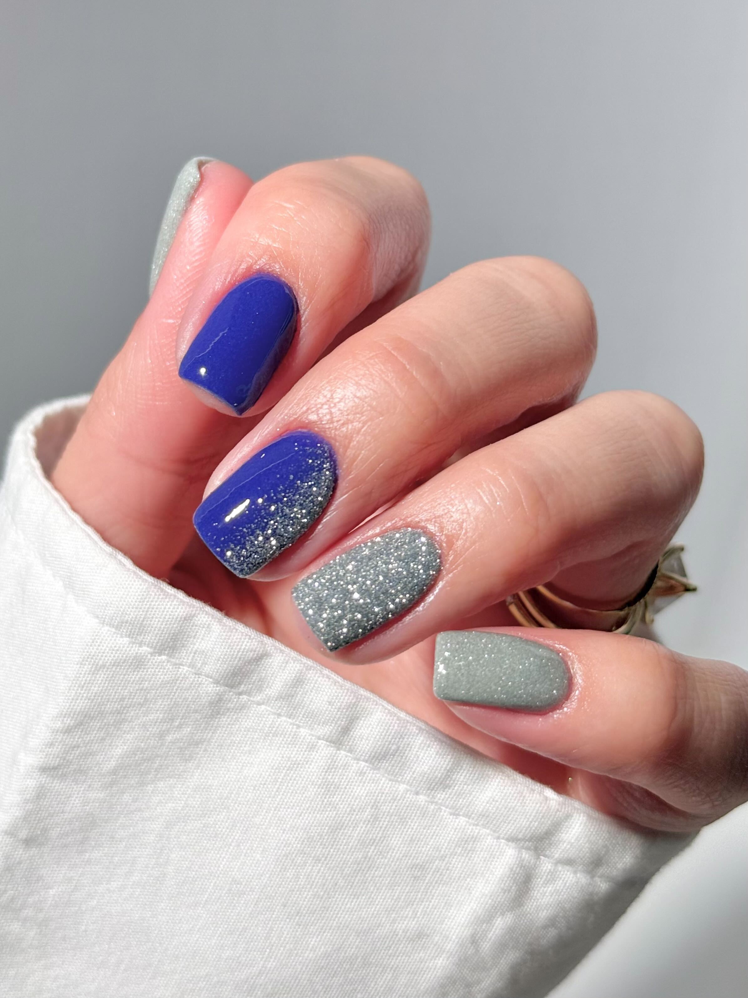 Royal blue nails mixed with silver glitter fade and full glitter nails