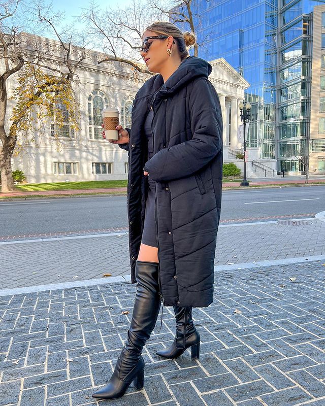 Long puffer jacket with tall boots